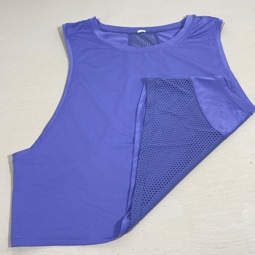 Sleeveless purple sports top with mesh back​​​​​​​​​​​​​​​